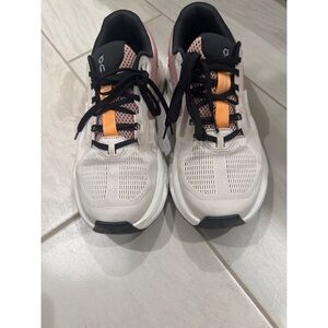 On Running White Sneakers with Orange Highlights